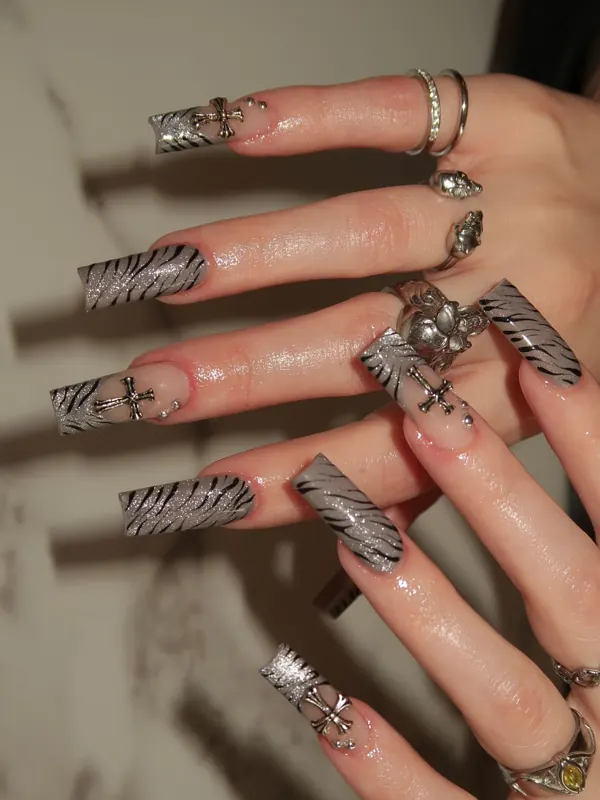 Silver zebra-print long coffin set with chrome charms by Nailed By Yvonne